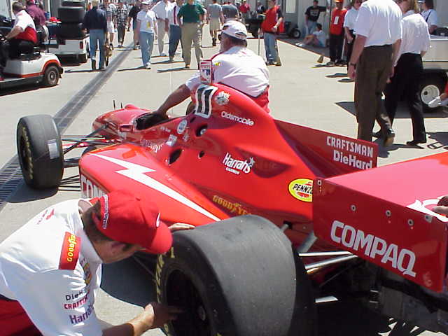 car getting pushed through garage area
